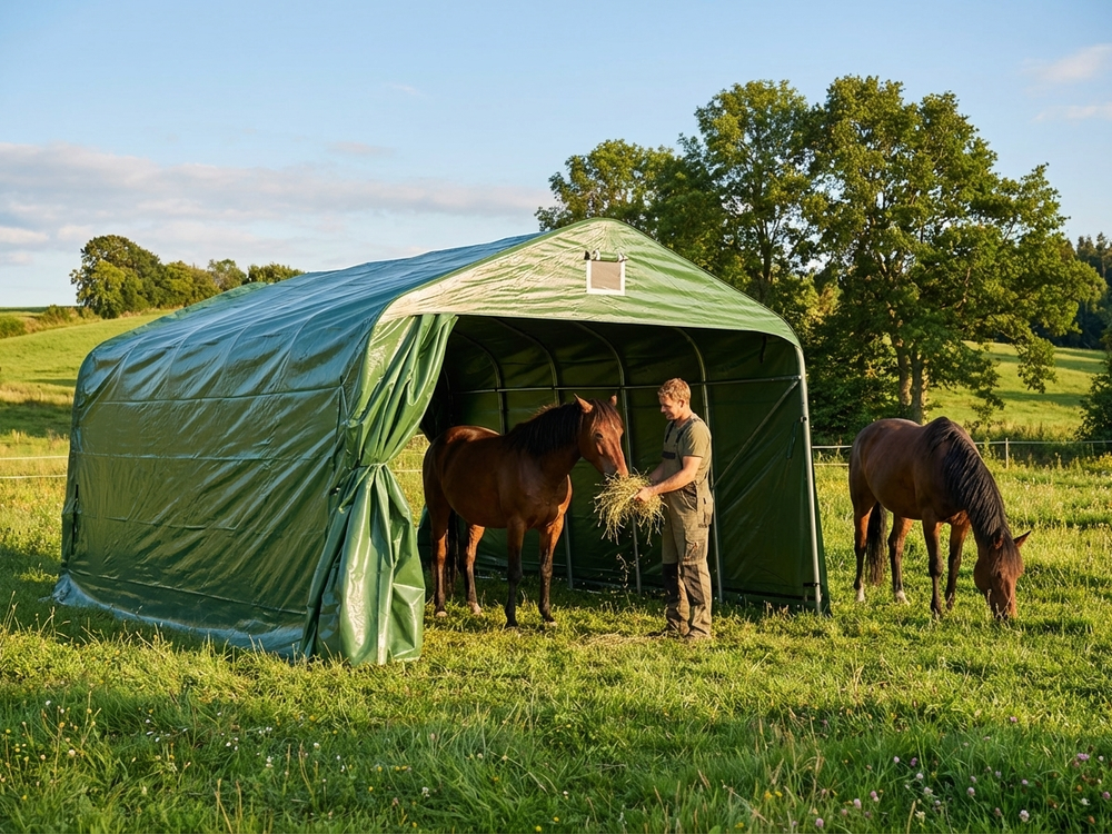 Green PVC livestock shelter with galvanised steel frame, perfect for outdoor protection